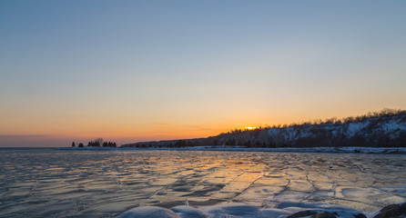 Scenic Sunset over a Frozen Lake