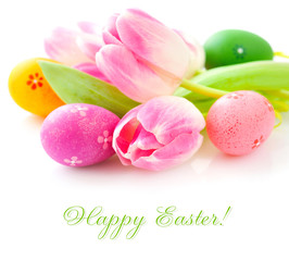Fototapeta na wymiar Easter eggs with pink tulip flowers on white background