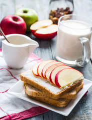 toast with ricotta and sweet red apple, a cup of milk