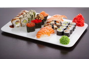 Fensteraufkleber Japanese tasty sushi set on white plate © z10e
