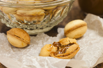 cakes in the form of nutlets with dairy cream