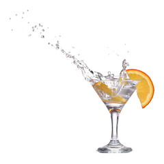Fototapeta na wymiar Orange or lemon slice fall in glass with water and make splash