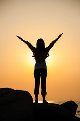 woman stands on rocks, free concept