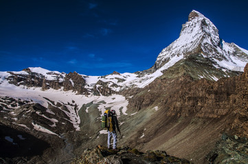 Fototapeta na wymiar climber looking at matterhorn mountain