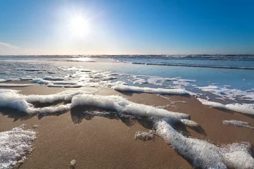 Foto auf Acrylglas Meer / Ozean Sonnenschein über Nordseestrand