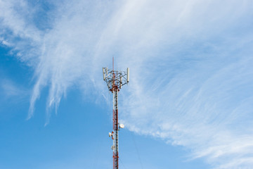 Obraz premium Telecommunications pole with nice cloud in sky