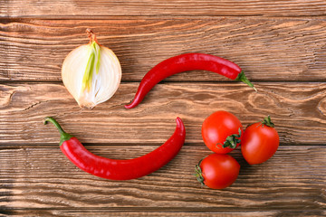 Juicy tomato cherry, white onion and red hot chili pepper