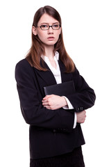 Confident young businesswoman / student standing arms crossed