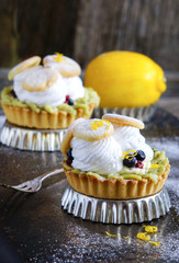 tartlets with cream, tea matcha curd and whisked egg whites