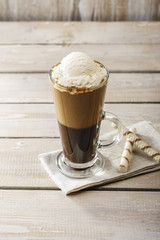 cold coffee with ice cream in a glass