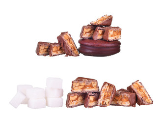 Chocolate bar with cubes sugar isolated on a white background