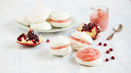 small meringue cakes with lemon and pomegranate curd