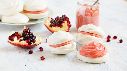 small meringue cakes with lemon and pomegranate curd