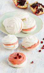 small meringue cakes with lemon and pomegranate curd