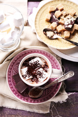 Hot chocolate with marshmallows in mug,