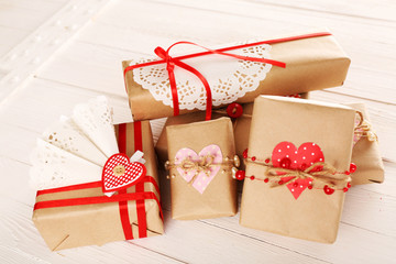 Beautiful gift boxes on wooden background. Valentine Day