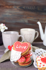 Heart shaped cookies for valentines day, teapot and cups