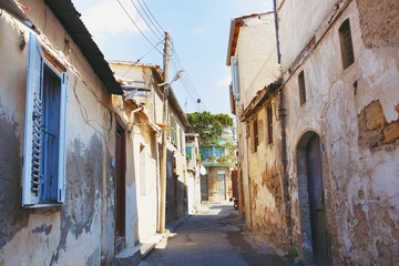 Fototapeta na wymiar Old narrow street in ancient town. Nicosia, Cyprus.