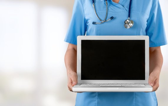 Document. Doctor Holding Blank Digital Tablet Isolated On White