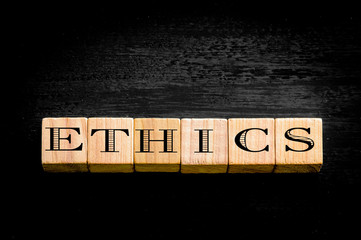 Word Ethics isolated on black background