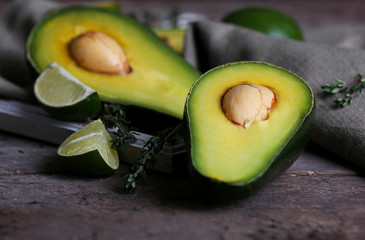 Sliced avocado with lime and herb