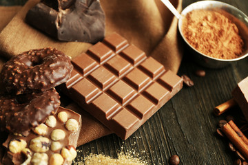 Still life with set of chocolate, nuts and spices