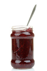 spoon in a jar of jam isolated
