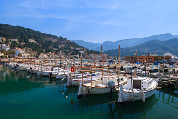 Fototapeta na wymiar Boats in Port Soller town on coast of Majorca island, Spain
