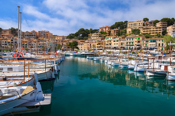 Fototapeta na wymiar Boats in Port Soller town on coast of Majorca island, Spain