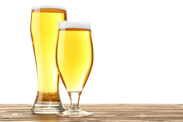 Glasses of beer on wooden table, isolated on white