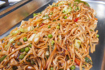 Vegetable chow mein meal at a buffet