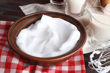 Whipped egg whites and other ingredients for cream