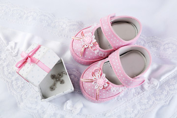 Baby shoe and cross for Christening