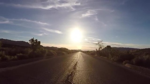 Redrock Canyon Desert Driving into Sun