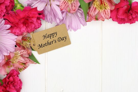 Mother's Day gift tag amongst a corner border of pink flowers