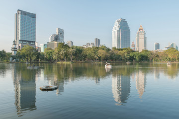 Fototapeta na wymiar Park in Modern city view of Bangkok, Thailand. Cityscape