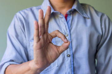 Fototapeta premium man hands showing ok sign