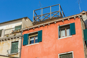 Fototapeta na wymiar Beautiful venetian windows of a typical Venetian house, Italy