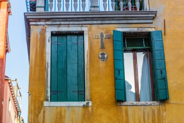 Fototapeta premium Beautiful venetian windows of a typical Venetian house, Italy