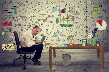 Senior businessman executive working on laptop in office