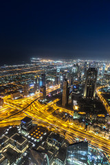 Fototapeta na wymiar Dubai downtown night scene with city lights,