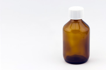 Medical glass bottle on white background 