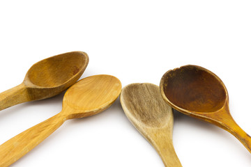 Group of different old used wooden spoon isolated