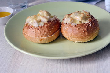 two buns with julienne, on a plate
