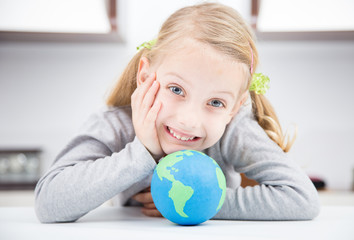 smile girl with earth globe