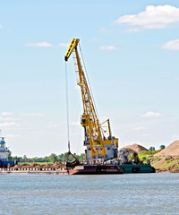 Fototapeta premium Crane river with barge