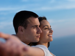 Fototapeta premium happy young romantic couple have fun arelax relax at home
