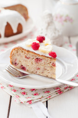 Banana Cake with Sugar Glaze Topped with Raspberries and Banana