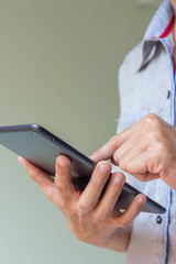 Businessman holding tablet