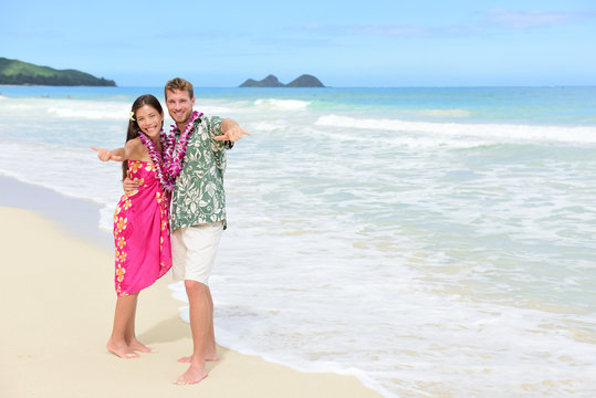 Aloha couple on Hawaiian beach - Hawaii vacations